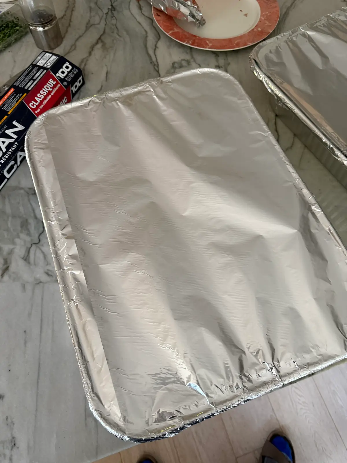 Step 4. The pans sealed with aluminum foil