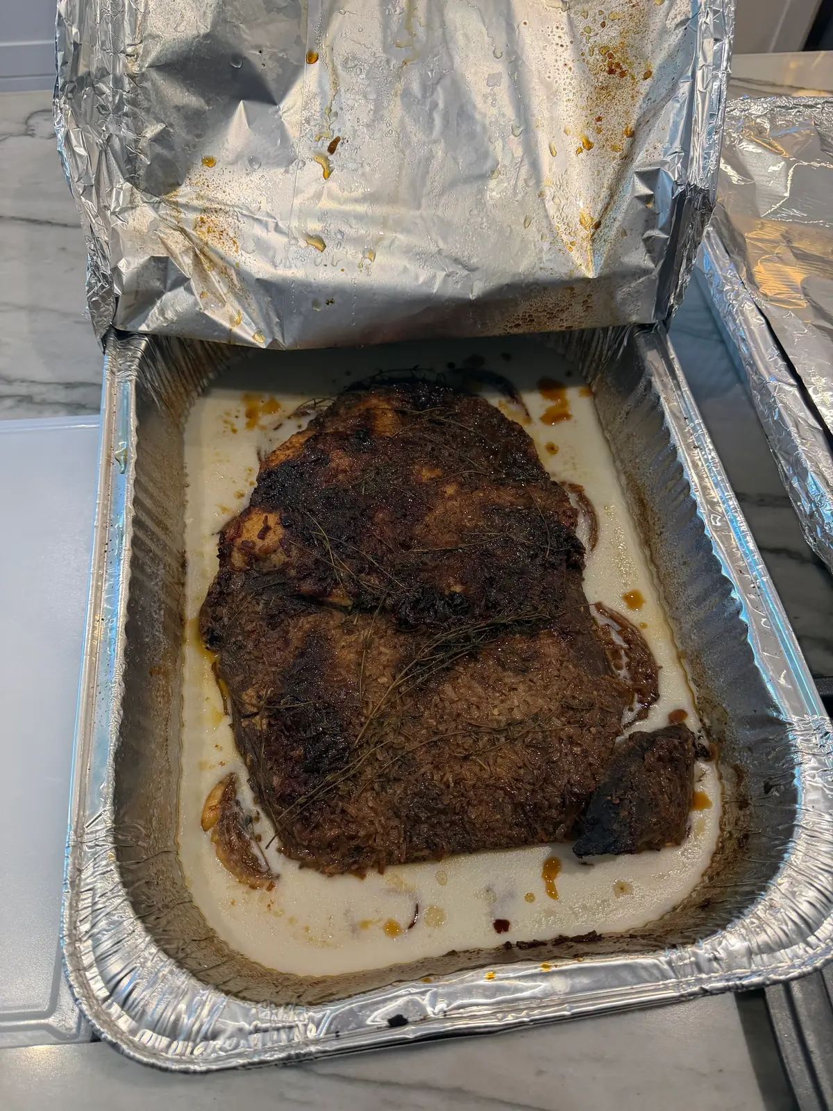 Step 7. The brisket after refrigerating overnight, with the fat and gelatin set around it