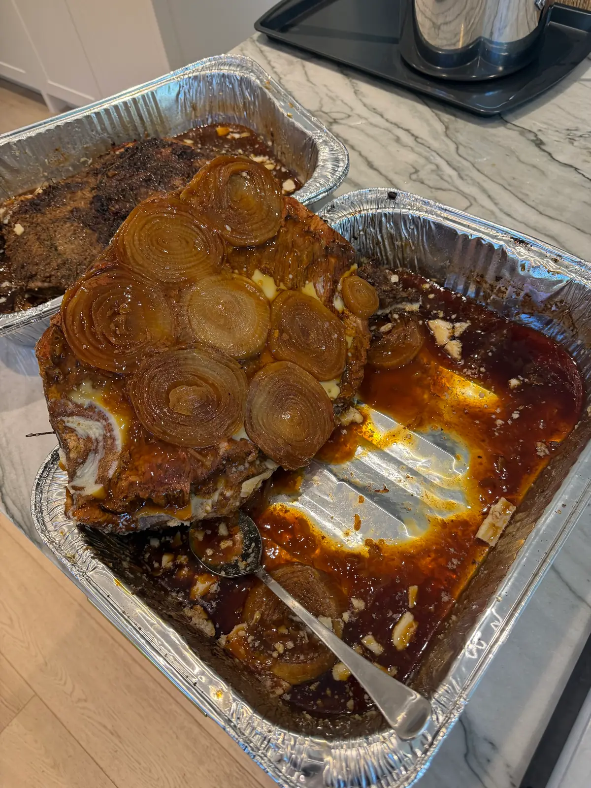 Step 8. The brisket lifted from the pan with the cooked onions on its underside
